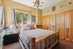 Forested views from this bedroom 